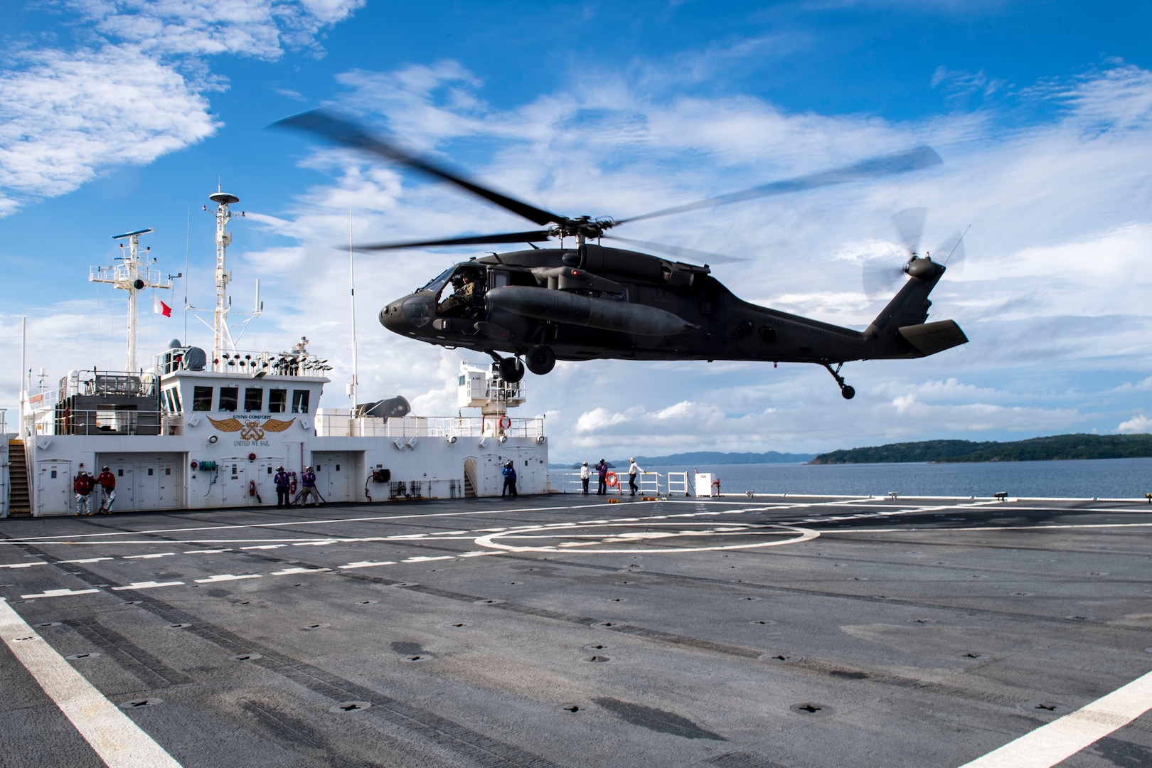 A UH-60 Blackhawk assigned to the 1st Battalion 228th Aviation Regiment completes a bounce off the U.S. Naval Ship Comfort during deck landing qualifications July 26, 2019, off the coast of Punta Arenas Costa Rica. U.S. Army Helicopter pilots and crew members of Joint Task Force –Bravo completed qualifications July 18-26 to support an upcoming mission, off the coast of Punta Arenas, Costa Rica (U.S. Air Force photo by Staff Sgt. Eric Summers Jr.)