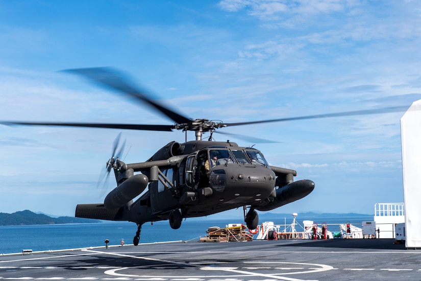 A UH-60 Blackhawk assigned to the 1st Battalion 228th Aviation Regiment completes a bounce off the U.S. Naval Ship Comfort during deck landing qualifications July 26, 2019, off the coast of Punta Arenas Costa Rica. U.S. Army Helicopter pilots and crew members of Joint Task Force –Bravo completed qualifications July 18-26 to support an upcoming mission, off the coast of Punta Arenas, Costa Rica. (U.S. Air Force photo by Staff Sgt. Eric Summers Jr.)