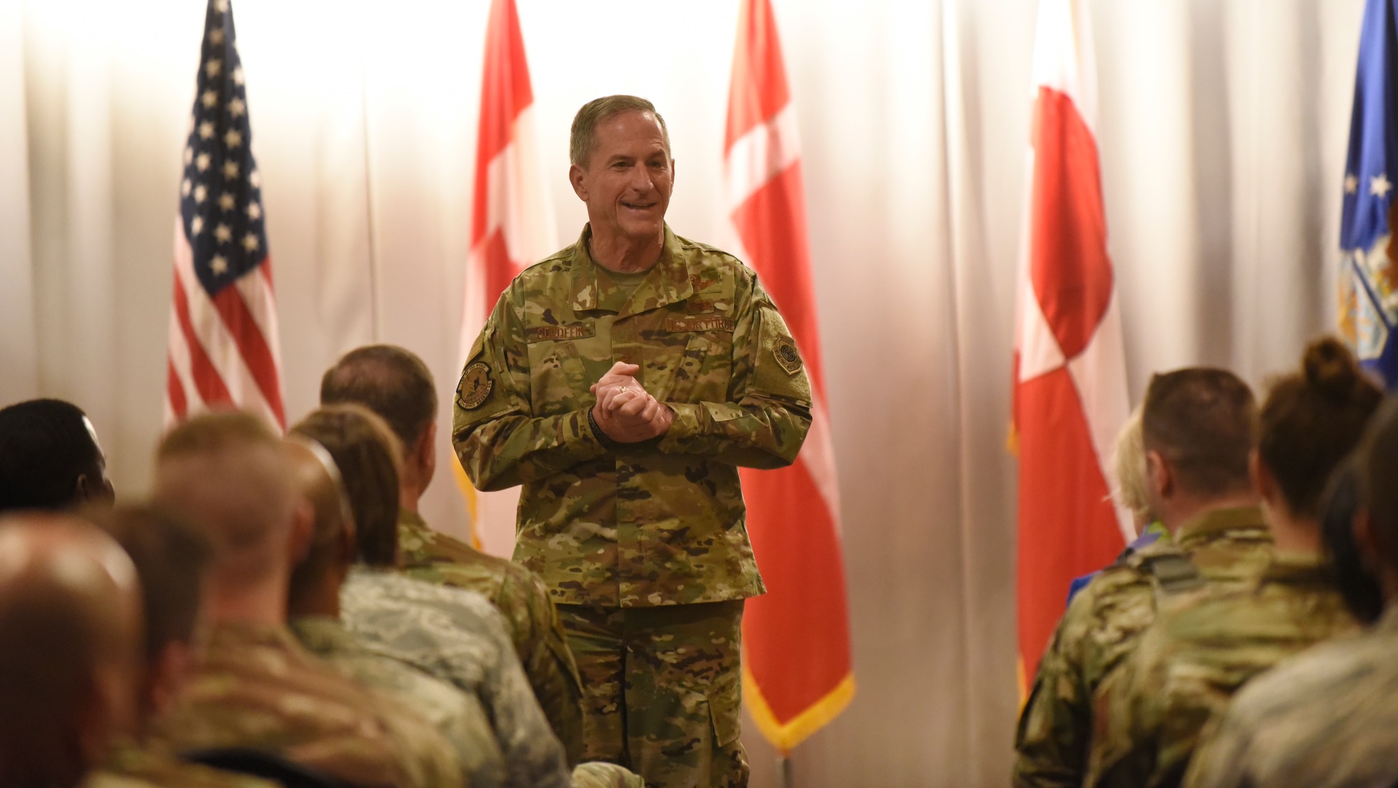 The 21st Air Force Chief of Staff David Goldfein speaks to the Airmen of the 821st Air Base Group during an all call at Thule Air Base, Greenland July 20, 2019. During the all call, Goldfein covered topics such as multi-domain operations, joint leaders and teams, and the importance of squadrons in the Air Force. (U.S. Air Force photo by Staff Sgt. Alexandra M. Longfellow)