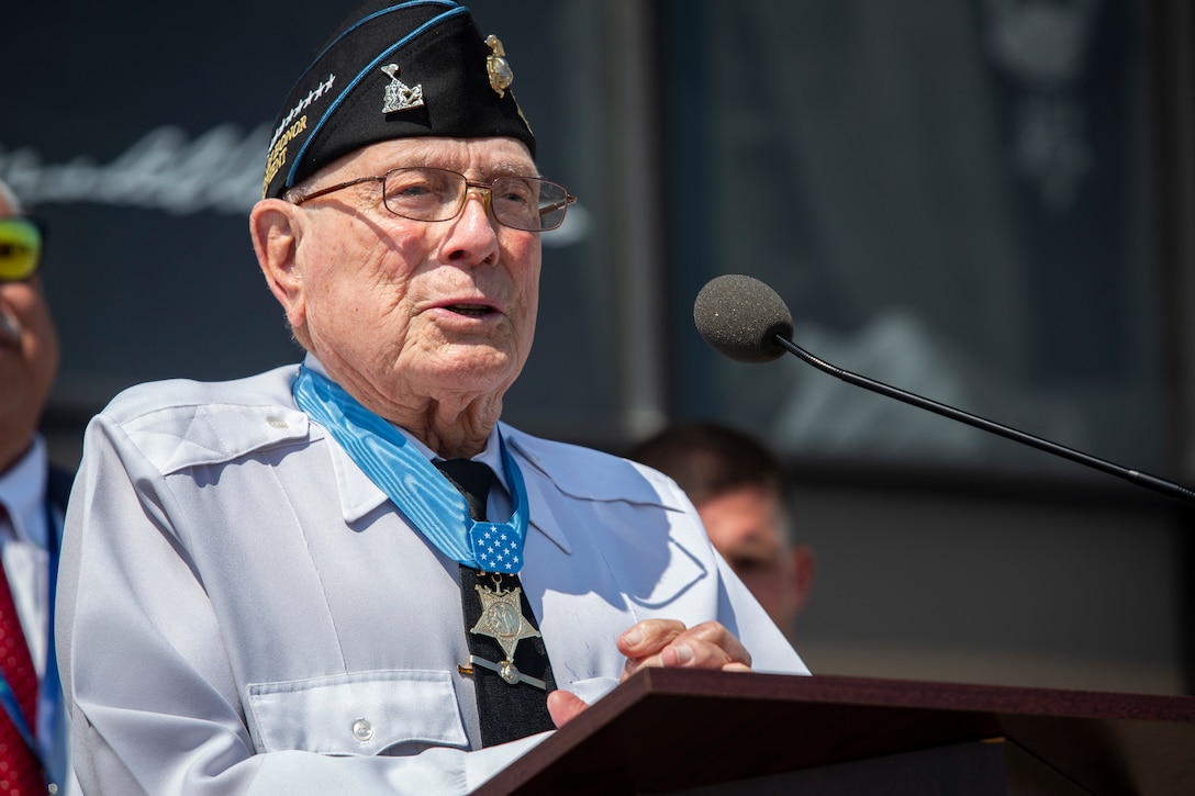 U.S. Marine Corps Chief Warrant Officer 4 Hershel "Woody" Williams (Ret.) speaks during a hangar dedication ceremony at the Capital Jet Center in Charleston, WV, July 26, 2019. Williams is the last surviving Marine Corps, World War II Medal of Honor recipient. (U.S. Marine Corps photo by Staff Sgt. William Holdaway)