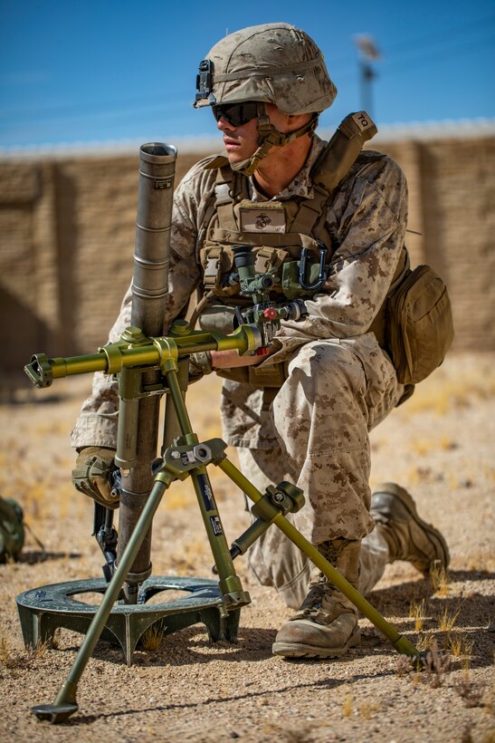 A U.S. Marine with 1st Battalion, 25th Marine Regiment, 4th Marine Division, sets up an M224 60mm mortar at Marine Corps Air Ground Combat Center Twentynine Palms, Calif., July 30, 2019, during Integrated Training Exercise 5-19. ITX 5-19 is an essential component of the Marine Forces Reserve training and readiness cycle. It serves as the principle exercise for assessing a unit’s capabilities. (U.S. Marine Corps photo by Sgt. Andy O. Martinez)