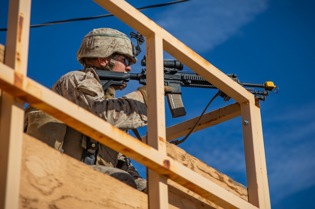 A U.S. Marine with 1st Battalion, 25th Marine Regiment, 4th Marine Division, posts security on top of a building at Marine Corps Air Ground Combat Center Twentynine Palms, Calif., July 30, 2019, during Integrated Training Exercise 5-19. ITX 5-19 is an essential component of the Marine Forces Reserve training and readiness cycle. It serves as the principle exercise for assessing a unit’s capabilities. (U.S. Marine Corps photo by Sgt. Andy O. Martinez)