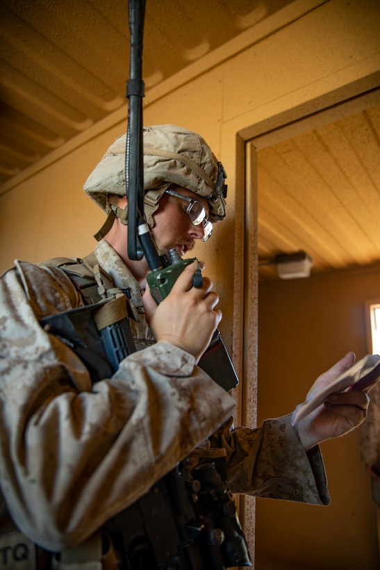 A U.S. Marine with 1st Battalion, 25th Marine Regiment, 4th Marine Division, communicates on a radio at Marine Corps Air Ground Combat Center Twentynine Palms, Calif., July 30, 2019, during Integrated Training Exercise 5-19. ITX 5-19 is an essential component of the Marine Forces Reserve training and readiness cycle. It serves as the principle exercise for assessing a unit’s capabilities. (U.S. Marine Corps photo by Sgt. Andy O. Martinez)