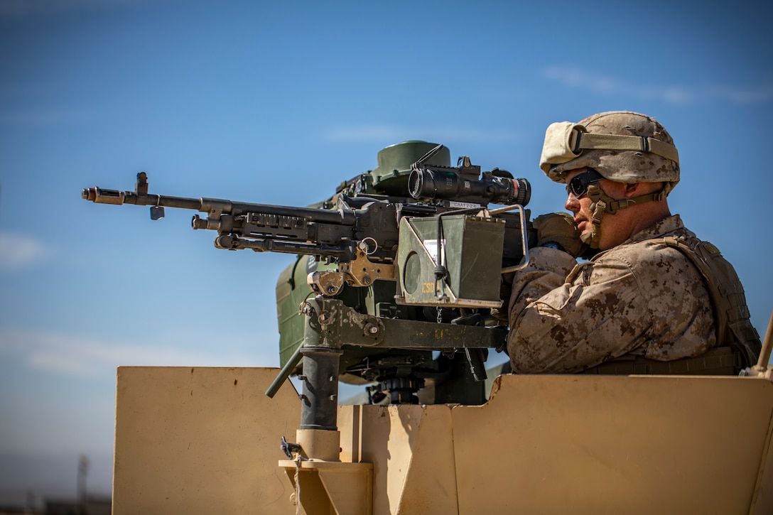 A U.S. Marine with 1st Battalion, 25th Marine Regiment, 4th Marine Division, uses a .50-caliber machine gun mounted on a Humvee to patrol at Marine Corps Air Ground Combat Center Twentynine Palms, Calif., July 30, 2019, during Integrated Training Exercise 5-19. ITX 5-19 is an essential component of the Marine Forces Reserve training and readiness cycle. It serves as the principle exercise for assessing a unit’s capabilities. (U.S. Marine Corps photo by Sgt. Andy O. Martinez)
