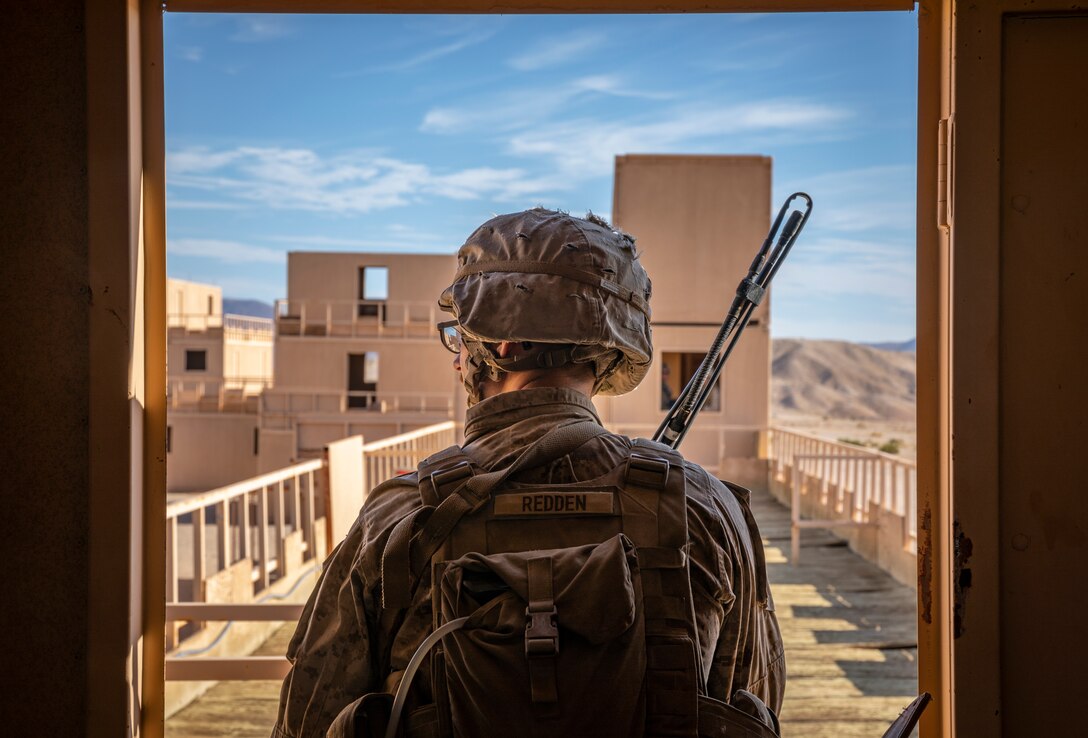 A U.S. Marine with 1st Battalion, 25th Marine Regiment, 4th Marine Division, communicates on a radio at Marine Corps Air Ground Combat Center Twentynine Palms, Calif., July 30, 2019, during Integrated Training Exercise 5-19. ITX 5-19 is an essential component of the Marine Forces Reserve training and readiness cycle. It serves as the principle exercise for assessing a unit’s capabilities. (U.S. Marine Corps photo by Sgt. Andy O. Martinez)