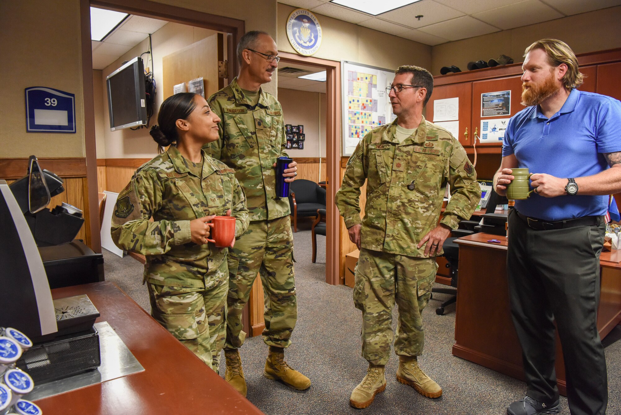 U.S. Air Force Lt. Col. Jason Knudeson, 480th Intelligence, Surveillance and Reconnaissance Wing chaplain, speaks with fellow Airmen at the Resiliency Cafe at Joint Base Langley-Eustis, Virginia, July 29, 2019. Thanks to a donation of 12 pallets of coffee containing 5,609 lbs. of coffee pods, whole bean and ground coffee by Holy Joe’s Cafe, the ART can continue uses these moments as another opportunity to engage with Airmen. (U.S. Air Force photo by Tech. Sgt. Darnell T. Cannady)