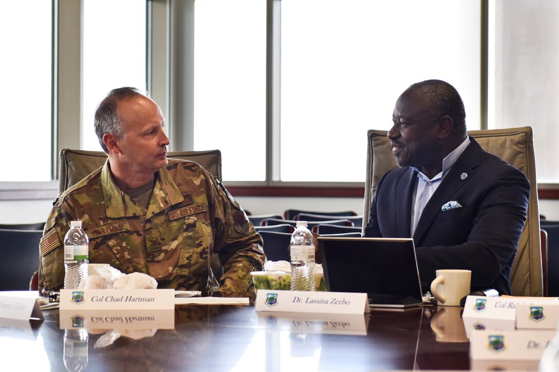 CTBTO Preparatory Commission Executive Secretary Dr. Lassina Zerbo (right) meets with Air Force Technical Applications Center Commander Col. Chad Hartman at Patrick AFB, Fla., July 25, 2019 to discuss the collaborative partnership the two organizations have been able to capitalize on by employing emerging technologies and breakthroughs in nuclear monitoring innovations.  (U.S. Air Force photo by Matthew S. Jurgens)