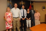 Defense Logistics Agency employees celebrate their retirement after more than 30 years.