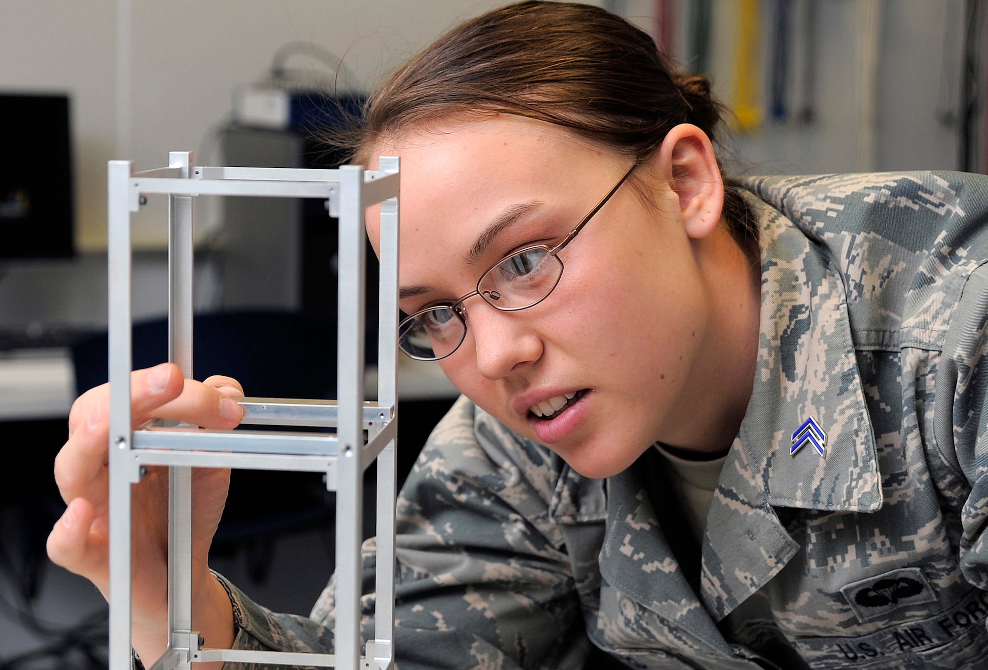 An Air Force Academy cadet works on an engineering project. The Academy has a large number of research relationships with the Air Force Research Laboratory, the Defense Advanced Research Projects Agency and industry leaders that exposes cadets to real-world technical problems.