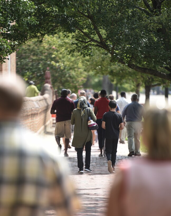 Joint Base Langley-Eustis members, their families and friends take a tour of Colonial Williamsburg during the 244th Chaplain Corps Anniversary celebration event in Williamsburg, Virginia, July 26, 2019.