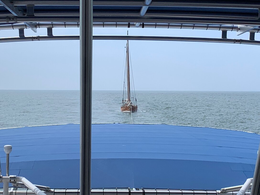 The Coast Guard Cutter Nathan Bruckenthal towed the sailboat Rainbow to safety in Virginia, Sunday, July 7, 2019, after the sailboat lost power 50 miles east of Cape Hatteras, NC. The pre-commissioned Coast Guard Cutter Midgett was 20 miles away when the distress occurred and stayed with the Rainbow until the Bruckenthal arrived. U.S. Coast Guard photo.