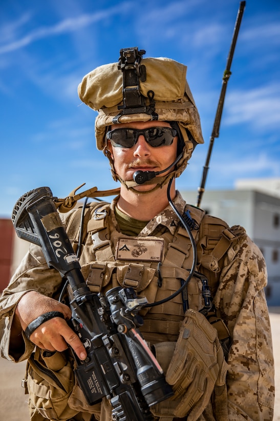 U.S. Marine Corps Lance Cpl. Dexter F. Sibley, an infantry radio operator with 1st Battalion, 25th Marine Regiment, 4th Marine Division, poses for a photo during Integrated Training Exercise 5-19 at Marine Corps Air Ground Combat Center Twentynine Palms, Calif., July 30, 2019. ITX 5-19 is an essential component of the Marine Forces Reserve training and readiness cycle. It serves as the principle exercise for assessing a unit’s capabilities. (U.S. Marine Corps photo by Lance Cpl. Jose Gonzalez)