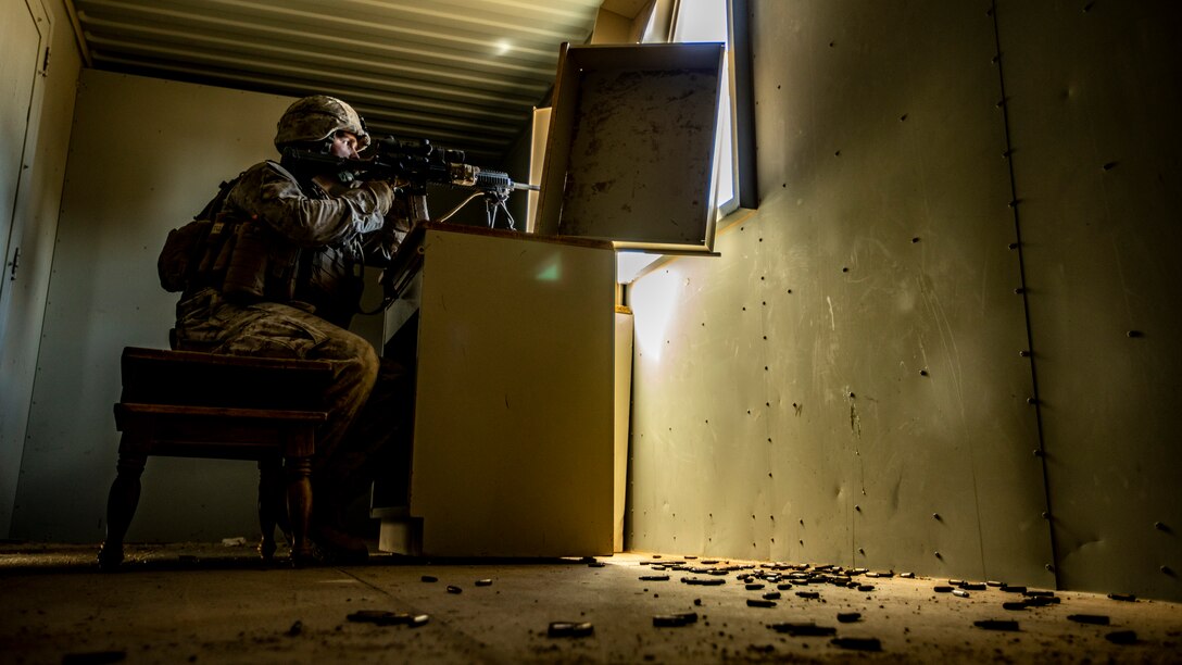 U.S. Marine Corps Lance Cpl. Tristan A. Castonguay, an infantry rifleman with 1st Battalion, 25th Marine Regiment, 4th Marine Division, scouts for simulated hostiles during Integrated Training Exercise 5-19 at Marine Corps Air Ground Combat Center Twentynine Palms, Calif., July 30, 2019. ITX 5-19 is an essential component of the Marine Forces Reserve training and readiness cycle. It serves as the principle exercise for assessing a unit’s capabilities. (U.S. Marine Corps photo by Lance Cpl. Jose Gonzalez)