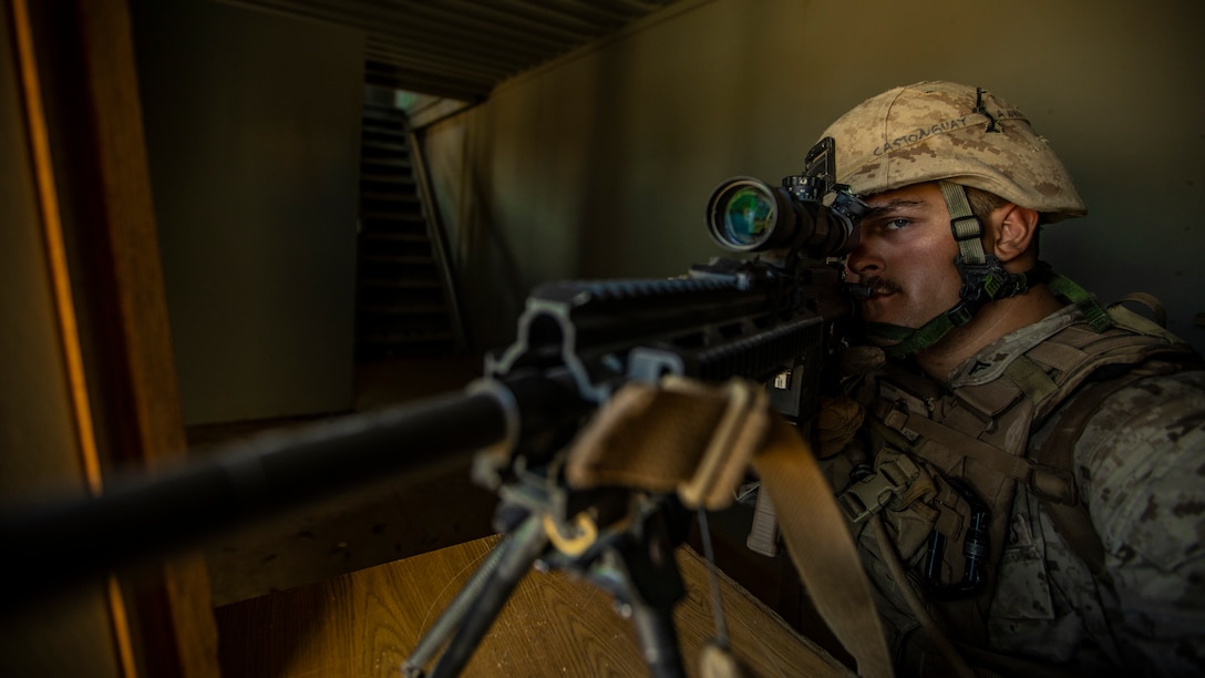 U.S. Marine Corps Lance Cpl. Tristan A. Castonguay, an infantry rifleman with 1st Battalion, 25th Marine Regiment, 4th Marine Division, scouts for simulated hostiles during Integrated Training Exercise 5-19 at Marine Corps Air Ground Combat Center Twentynine Palms, Calif., July 30, 2019. ITX 5-19 is an essential component of the Marine Forces Reserve training and readiness cycle. It serves as the principle exercise for assessing a unit’s capabilities. (U.S. Marine Corps photo by Lance Cpl. Jose Gonzalez)