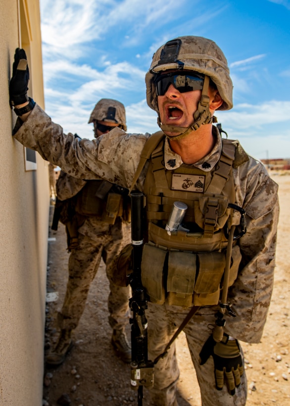 A U.S. Marine with 1st Battalion, 25th Marine Regiment, 4th Marine Division, shouts commands during Integrated Training Exercise 5-19 at Marine Corps Air Ground Combat Center Twentynine Palms, Calif., July 30, 2019. ITX 5-19 is an essential component of the Marine Forces Reserve training and readiness cycle. It serves as the principle exercise for assessing a unit’s capabilities. (U.S. Marine Corps photo by Lance Cpl. Jose Gonzalez)
