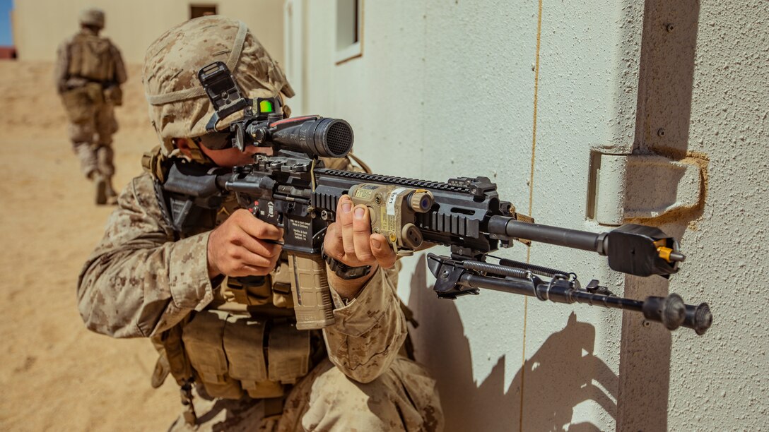 A U.S. Marine with 1st Battalion, 25th Marine Regiment, 4th Marine Division, engages with simulated hostiles during Integrated Training Exercise 5-19 at Marine Corps Air Ground Combat Center Twentynine Palms, Calif., July 30, 2019. ITX 5-19 is an essential component of the Marine Forces Reserve training and readiness cycle. It serves as the principle exercise for assessing a unit’s capabilities. (U.S. Marine Corps photo by Lance Cpl. Jose Gonzalez)