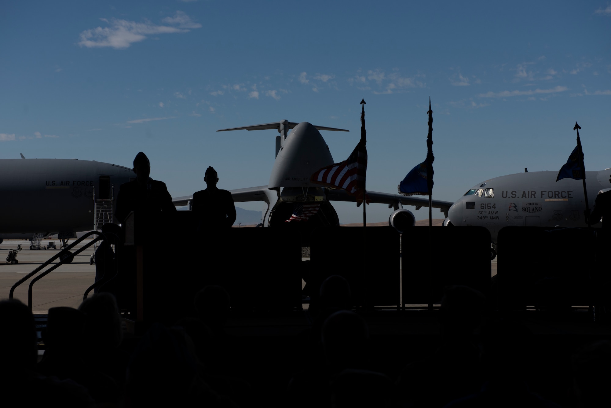 U.S. Air Force Col. Jeff Nelson, 60th Air Mobility Wing commander, delivers remarks July 26, 2019, during the 60th Operations Group change of command ceremony at Travis Air Force Base, California. During the ceremony, Col. Theresa Weems, outgoing 60th OG commander, transferred command to Col. Gregg Johnson. (U.S. Air Force photo by Tech. Sgt. James Hodgman)
