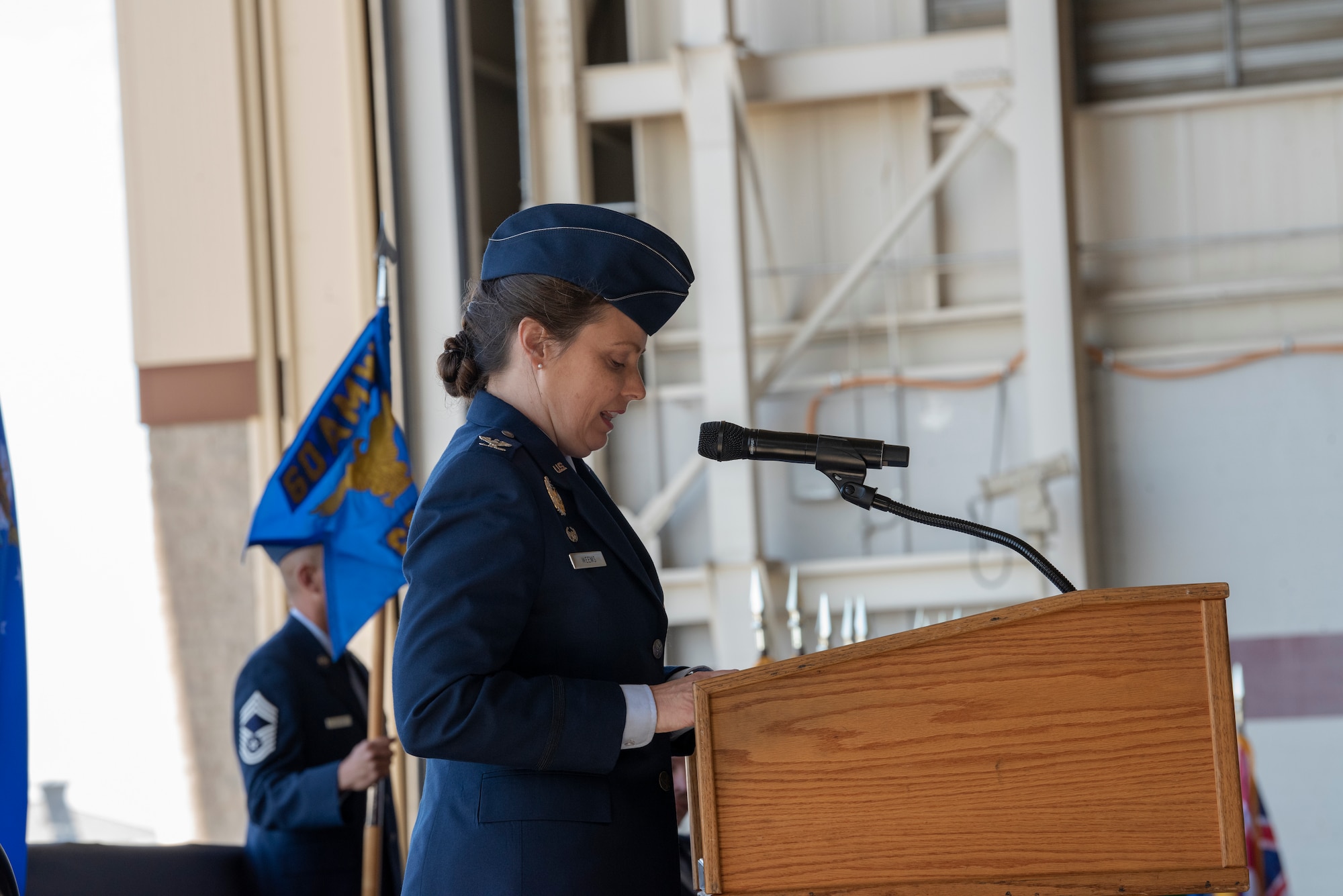U.S. Air Force Col. Theresa Weems, outgoing 60th Operations Group commander, delivers a speech during the 60th OG change of command ceremony July 26, 2019, at Travis Air Force Base, California. After giving her speech, Weems transferred command to Col. Gregg Johnson. (U.S. Air Force photo by Tech. Sgt. James Hodgman)