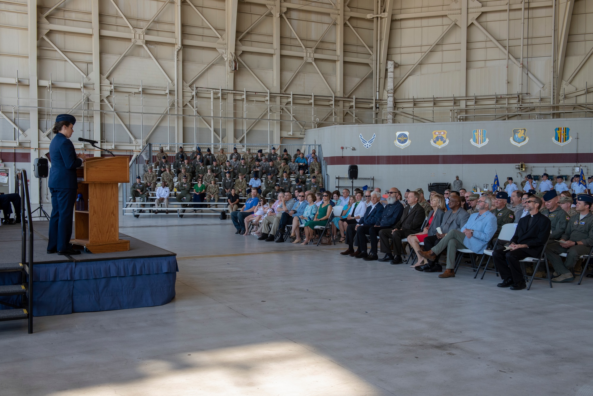 U.S. Air Force Col. Theresa Weems, outgoing 60th Operations Group commander, delivers a speech during the 60th OG change of command ceremony July 26, 2019, at Travis Air Force Base, California. After giving her speech, Weems transferred command to Col. Gregg Johnson. (U.S. Air Force photo by Tech. Sgt. James Hodgman)