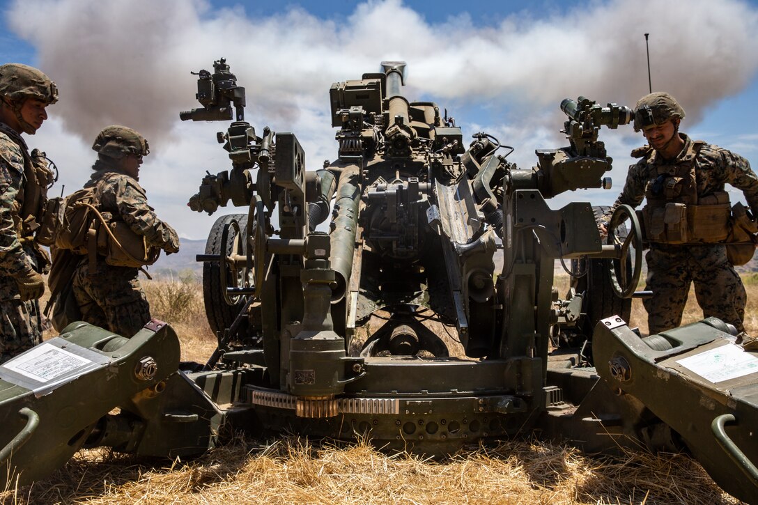 U.S. Marines with Fox Battery, 2nd Battalion, 11th Marine Regiment, 1st Marine Division, fire an M777 howitzer during Summer Fire Exercise 19 at 62 Area on Marine Corps Base Camp Pendleton, California, July 23, 2019. The Marines are conducting Summer FIREX, a live-fire regimental-level exercise, from July 22 to Aug. 1. The exercise is designed to bring the entire regiment together and maximize the training areas available on Camp Pendleton to enhance their ability to conduct real-world operations.
