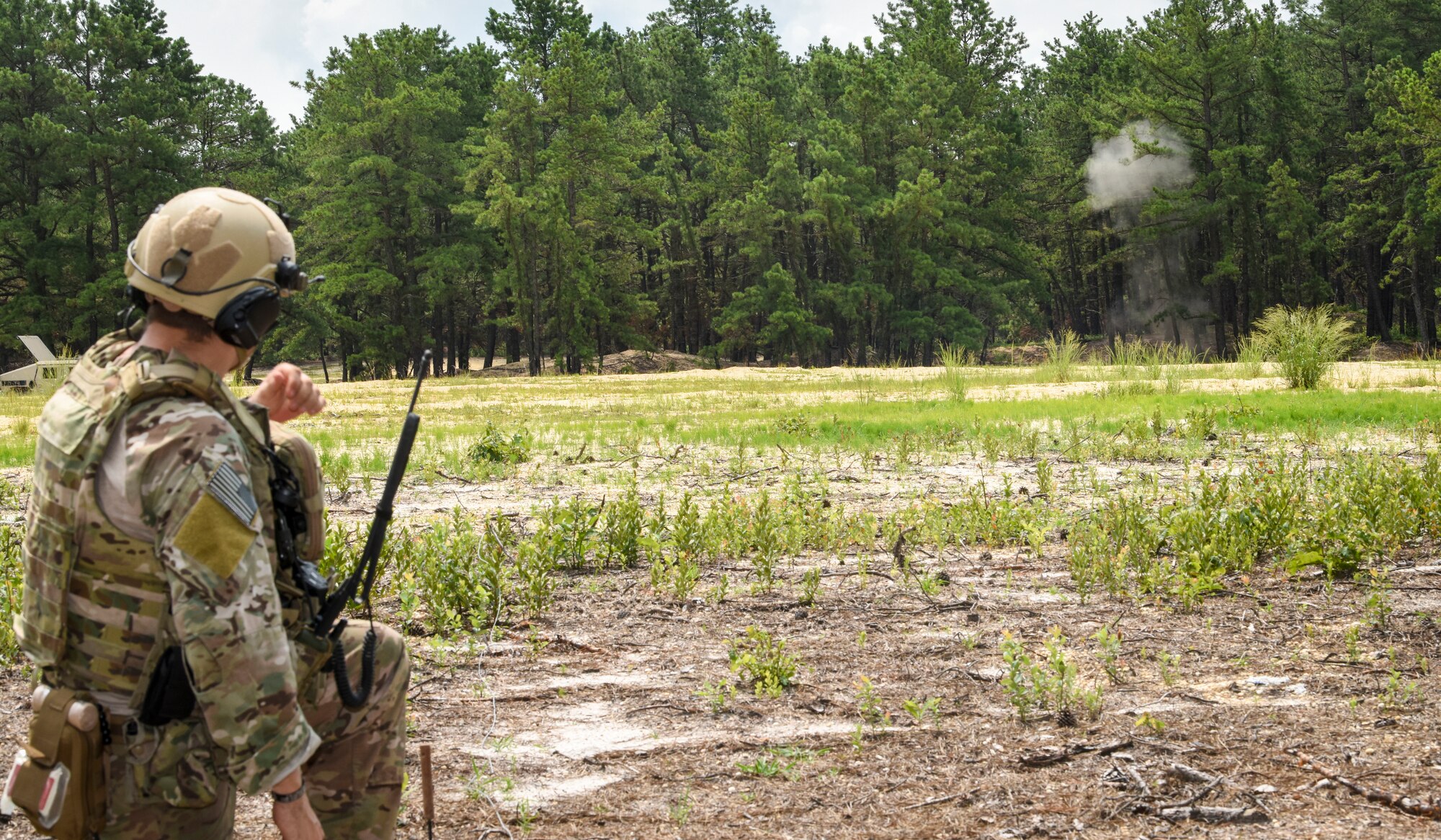 U.S. Air Force Airman 1st Class Russell Bongiovanni, 177th Civil Engineer Squadron Explosive Ordnance Disposal technician from the New Jersey Air National Guard, detonates an Unexploded Ordnance (UXO) during the Cerulean Raptor field training exercise, July 10, 2019 at Joint Base McGuire-Dix-Lakehurst, New Jersey. (U.S. Air Force photo by Staff Sgt. AJ Hyatt)