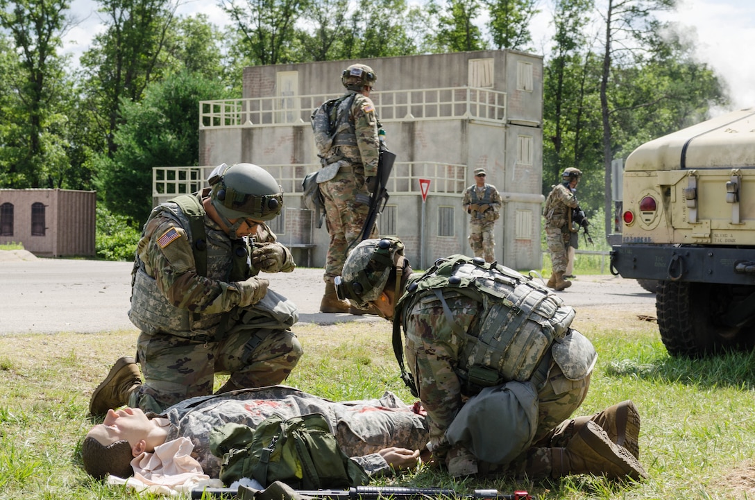 Quartermaster Soldiers evaluate and Evacuate a Casualty