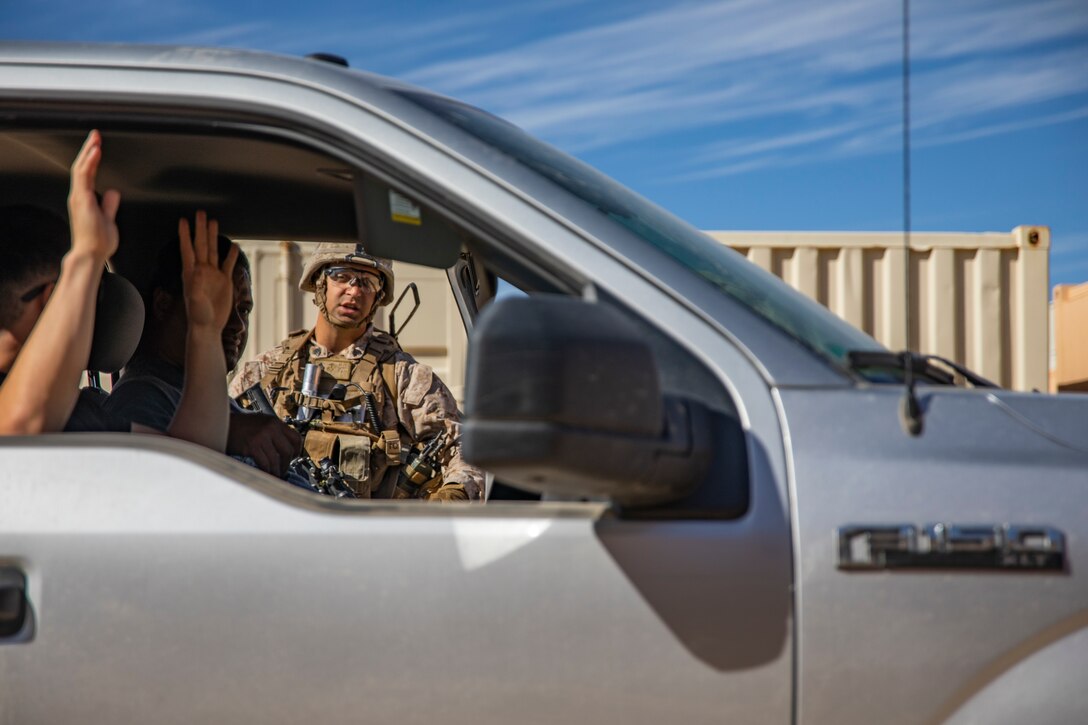 A U.S. Marine with 1st Battalion, 25th Marine Regiment, 4th Marine Division, gives commands to a vehicle driver at Marine Corps Air Ground Combat Center Twentynine Palms, Calif., July 30, 2019, during Integrated Training Exercise 5-19. ITX 5-19 is an essential component of the Marine Forces Reserve training and readiness cycle. It serves as the principle exercise for assessing a unit’s capabilities. (U.S. Marine Corps photo by Sgt. Andy O. Martinez)