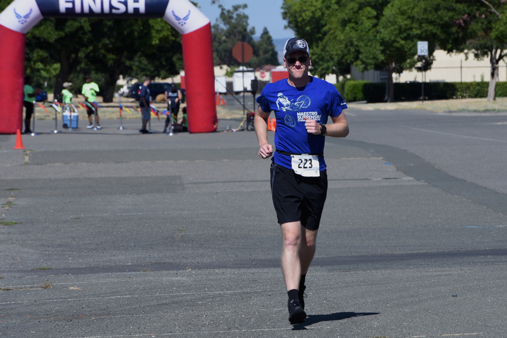Chad Baltozer, Travis Triathlon participant, runs during the third portion of the multi-sport race July 27, 2019, at Travis Air Force Base, California. During the triathlon, which is in its 26th year, 31 athletes competed against one another. Participants had to swim 400 meters, bike 12 miles and run 3.1 miles. (U.S. Air Force Photo by Airman 1st Class Cameron Otte)