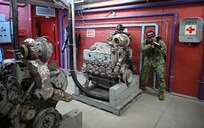 IMAGE: 190613-N-PO203-0218 CHESAPEAKE, Virginia (Jun. 13, 2019) Sailors assigned to the Center for Security Forces detachment in Chesapeake, Va., demonstrate the Office of Naval Research Global (ONRG) TechSolutions-sponsored Tactically Reconfigurable Artificial Combat Enhanced Reality (TRACER) system. TechSolutions partnered with Naval Surface Warfare Center Dahlgren Division to develop the TRACER package, which consists of a virtual-reality headset, a backpack, a state-of-the-art simulated weapon designed to deliver realistic recoil, and a software package that creates multiple and adaptable simulation scenarios for security personnel to experience. ONRG TechSolutions allows Sailors and Marines to submit technology requests directly to the development community for rapid response prototyping. (U.S. Navy photo by John F. Williams)