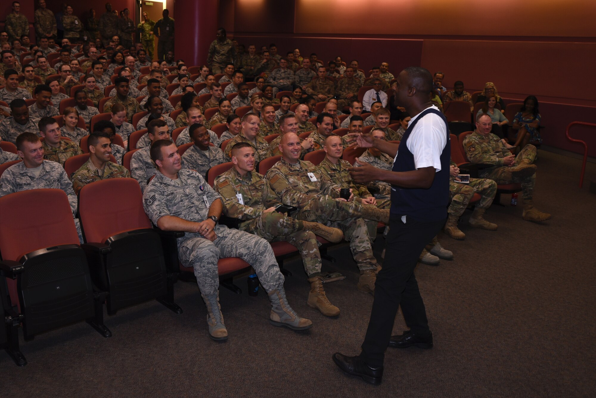 Retired U.S. Air Force Chief Master Sgt. Juan Lewis, the (Fired up Chief), speaks with Airmen July 26, 2019, at Travis Air Force Base, California. Lewis spoke with Airmen about the importance of having passion, enthusiasm and pride, something that has guided his 28-year military career. In retirement, Lewis travels to bases across the United States to share his experiences with Airmen. (U.S. Air Force photo by Airman 1st Class Cameron Otte)