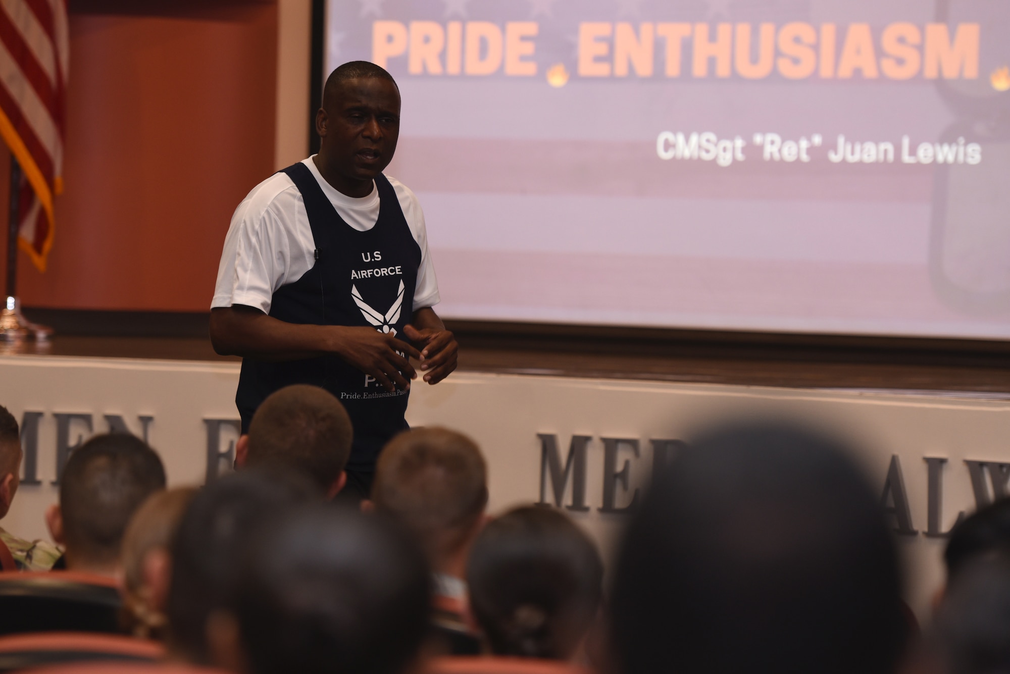 Retired U.S. Air Force Chief Master Sgt. Juan Lewis, the (Fired up Chief), speaks with Airmen July 26, 2019, at Travis Air Force Base, California. Lewis spoke with Airmen about the importance of having passion, enthusiasm and pride, something that has guided his 28-year military career. In retirement, Lewis travels to bases across the United States to share his experiences with Airmen. (U.S. Air Force photo by Airman 1st Class Cameron Otte)