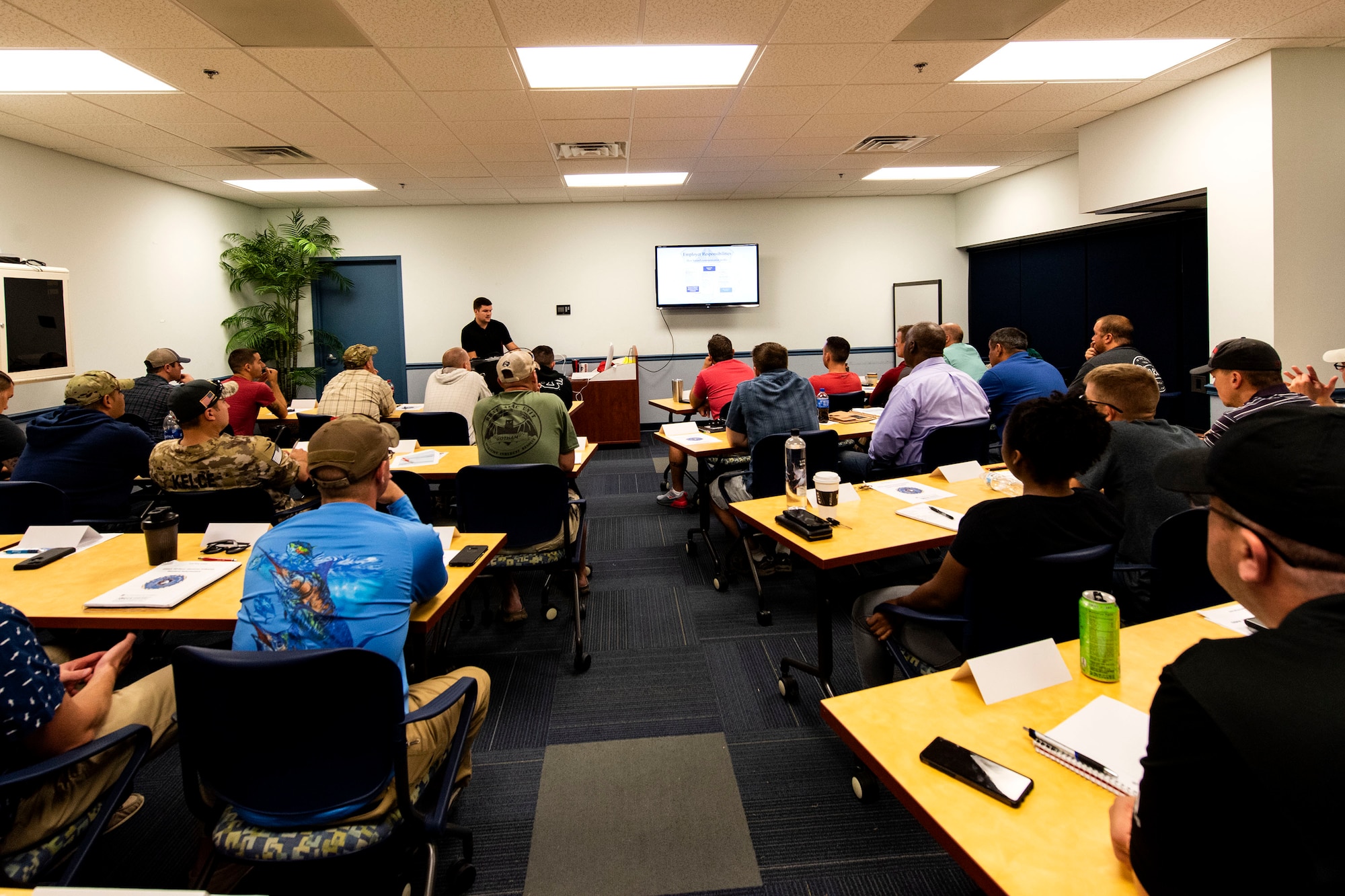 Participants listen to Staff Sgt. Mason Meherg, 23d Wing NCO in charge of occupational safety inspections and training, during an OSHA training course, July 31, 2019, at Moody Air Force Base, Ga. The training is part of OSHA’s outreach training program, and covered an overview of the hazards a worker may encounter on a job site. The training emphasized hazard identification, avoidance, control and prevention. (U.S. Air Force photo by Senior Airman Erick Requadt)