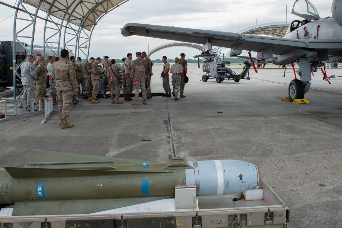 The 75th Aircraft Maintenance Unit prepares to conduct integrated combat training, July 26, 2019, at Moody Air Force Base, Ga. The integrated combat training involved Airmen from several specialties who worked simultaneously to refuel and upload munitions on to an A-10C Thunderbolt II. The training also allowed Airmen to gain experience quick-turning an aircraft, which helped increase their readiness in support of contingency operations. (U.S. Air Force photo by Airman Azaria E. Foster)
