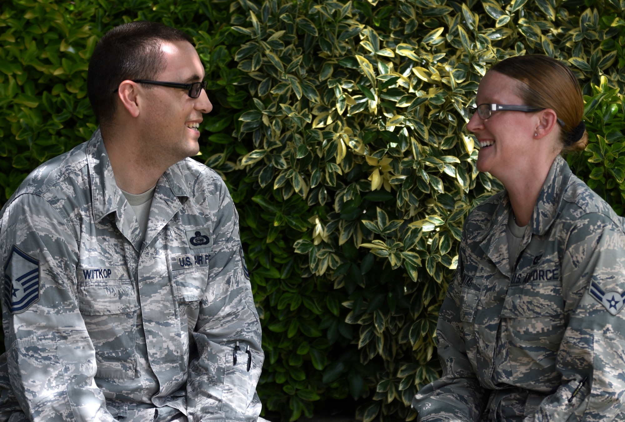 U.S. Air Force Master Sgt. Stuart Witkop, left, 34th Intelligence Squadron supervisor, and Airman1st Class Mary Witkop, 70th Operations Support Squadron technician, pose for a photo at Fort George G. Meade, Maryland, June 19, 2019,. Mary was a Key Spouse for the 34th IS for four years before enlisting in September 2018. (U.S. Air Force photo by Senior Airman Gerald R. Willis)