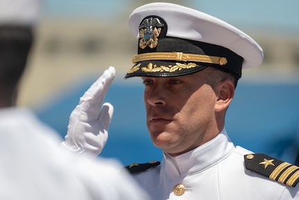 JOINT BASE PEARL HARBOR-HICKAM, Hawaii (May 31, 2019) Cmdr. Matthew Lewis is piped ashore after a change of command of the Virginia-class fast-attack submarine USS North Carolina (SSN 777)at Joint Base Pearl Harbor-Hickam, Hawaii, May 31. Cmdr. Matthew Lewis, commanding officer of North Carolina, was relieved by Cmdr. Michael Fisher, after more than 30 months in command of the vessel. (U.S. Navy Photo by Mass Communication Specialist 1st Class Daniel Hinton)
