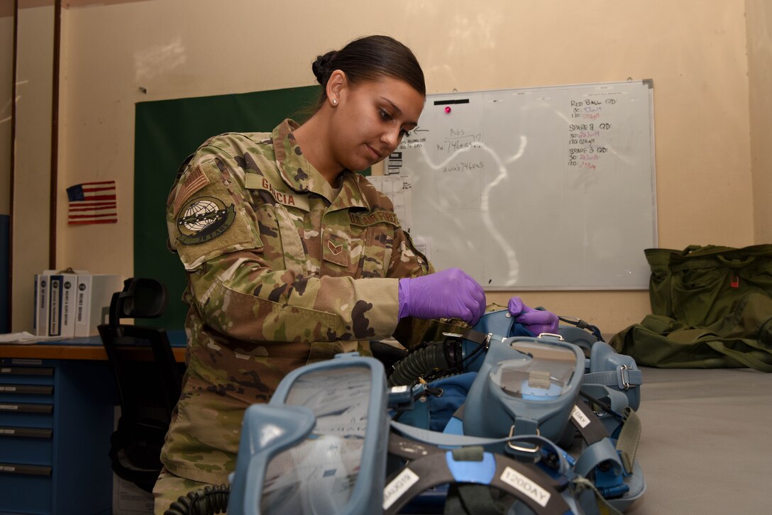 Senior Airman Taylor Garcia, 28th Expeditionary Air Refueling Squadron aircrew flight equipment technician performs maintenance checks at Al Udeid AB, Qatar, June 1, 2019. The 385th Air Expeditionary Group recently celebrated its one year anniversary being activated at Al Udeid Air Base on May 14, 2019. (U.S. Air Force photo by Staff Sgt. Ashley L. Gardner)