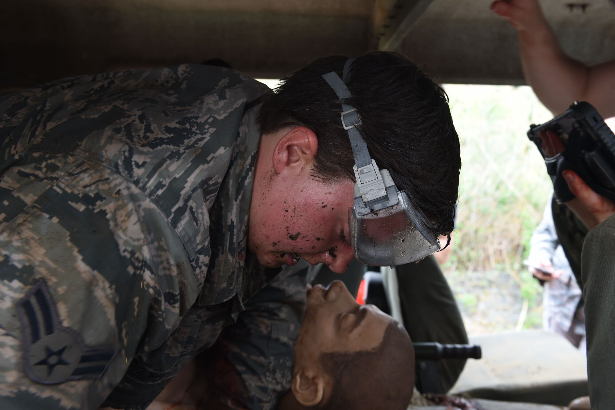 Airman First Class Samantha Brooner, aerospace medical technician, participates in the Tactical Casualty Combat Course (TCCC) at Naval Air Station I (NAS) Sigonella on May 14, 2019. The TCCC is an improved field care that helps field medics sharpen and hone their skills. (U.S. Air National Guard photo by Senior Airman Katelyn Sprott)