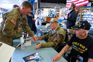 WWII veterans formerly assigned to the 82nd Airborne Division in Carentan, France