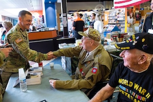 WWII veterans formerly assigned to the 82nd Airborne Division in Carentan, France