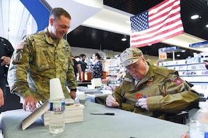 WWII veterans formerly assigned to the 82nd Airborne Division in Carentan, France