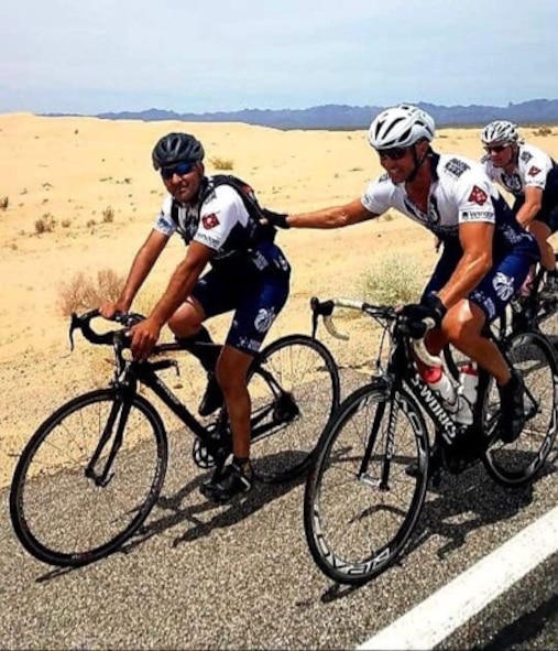 Mission2Alpha teammates encourage one another during a 400-mile bicycle ride from Carefree, Ariz. to San Diego, May 2, 2019.
