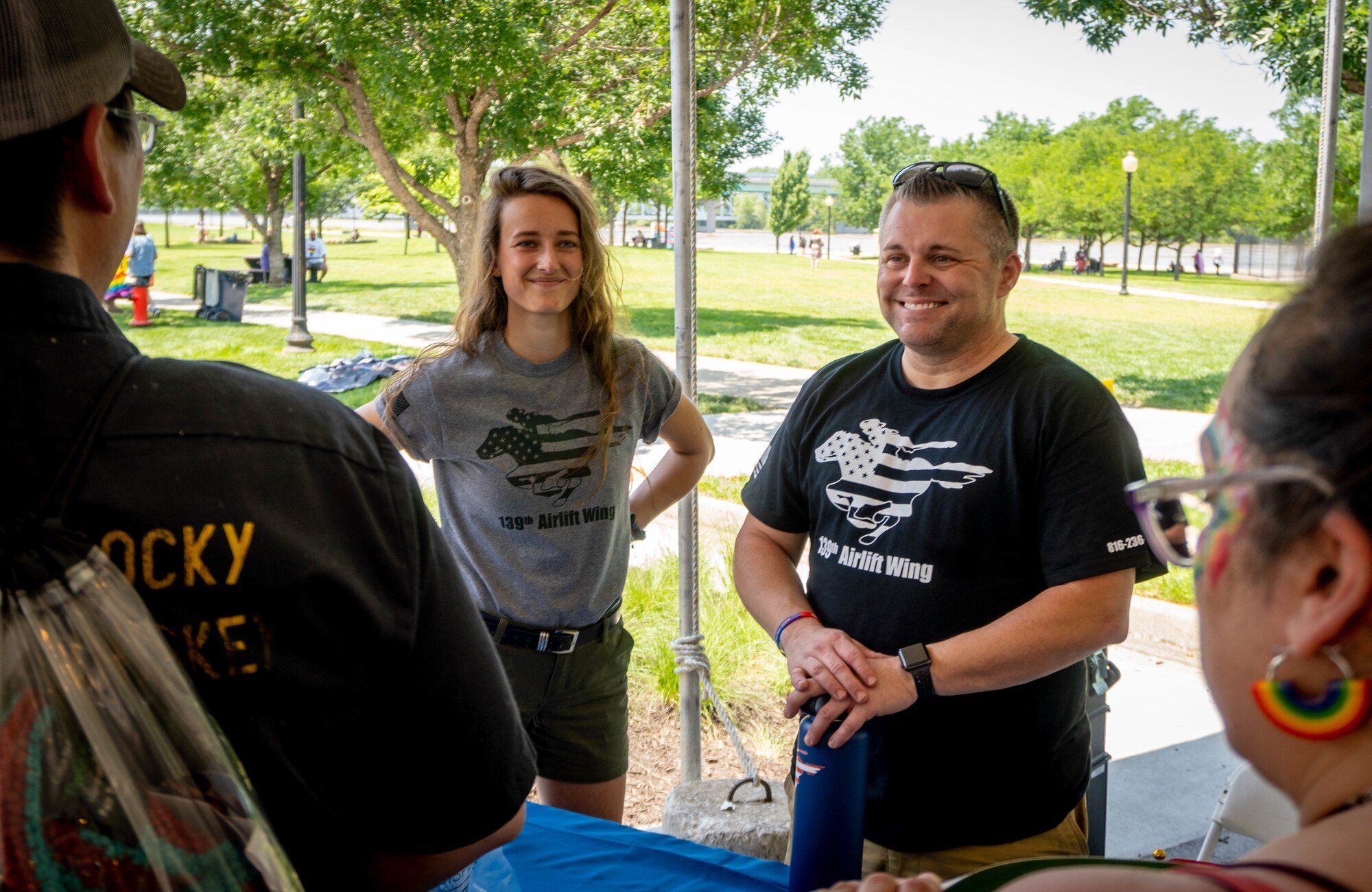 Recruiter talks with festival attendees