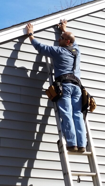Master Sgt. Alex Hernandez, 718th Intelligence Squadron, helped build three homes for Habitat for Humanity. Hernandez and other Airmen from his squadron installed roofing, built frameworks, put up sheetrock, completed siding work, and did work on metal trimming.