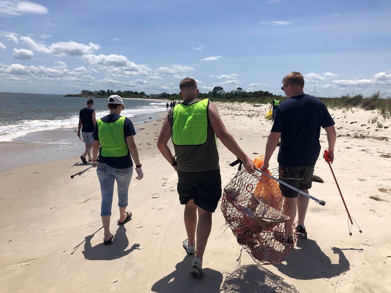Thirteen Airmen from the 718th Intelligence Squadron participated in a community outreach project with the Hampton Clean City Commission. In honor of Earth Day, they coordinated a beach cleanup for the Grandview Island Nature Preserve in Hampton. The team collected three bags of trash and removed several large crab traps and other large items and debris.