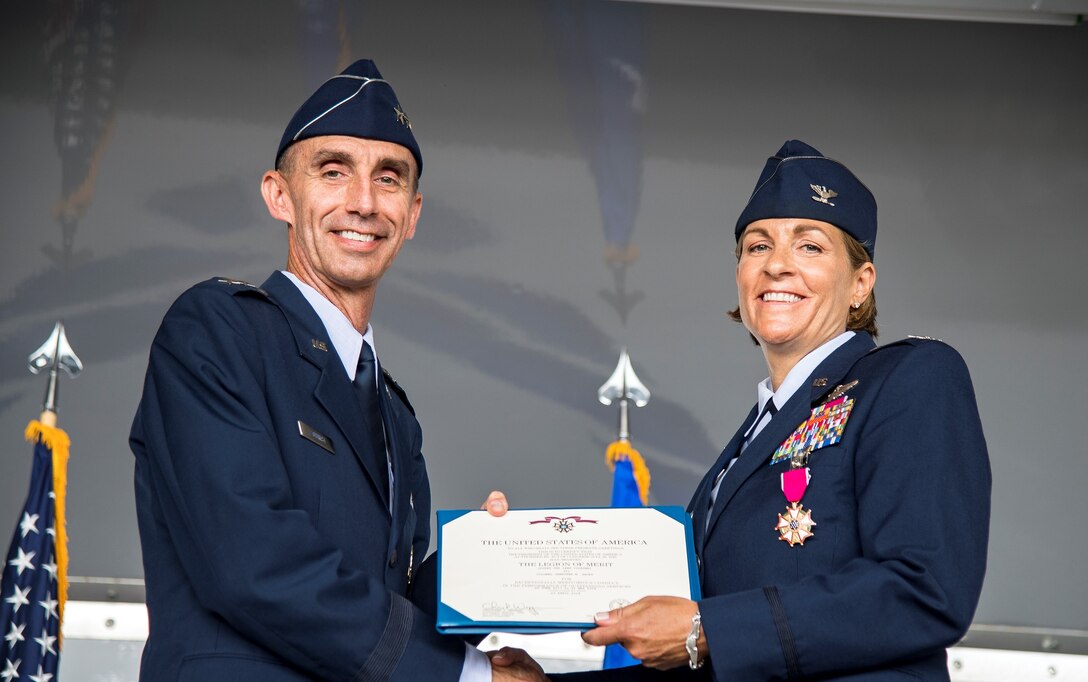 Maj. Gen. Scott Zobrist, 9th Air Force commander, presents Col. Jennifer M. Short, 23d Wing commander, with the Legion of Merit during the 23d Wing change of command ceremony, May 31, 2019, at Moody Air Force Base, Ga. The Legion of Merit is a military award of the United States Armed Forces that is given for exceptionally meritorious conduct in the performance of outstanding services and achievements. (Courtesy Photo)