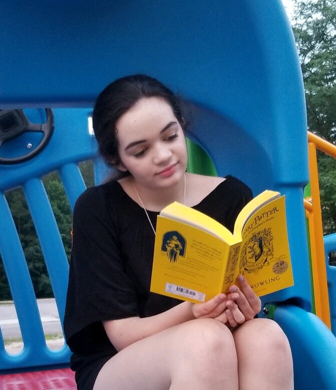 Find a quiet spot outdoors, under a tree, or in the cool AC and escape into a good book. (courtesy photo)