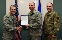 Airman 1st Class Tobias Titus, an aerospace Medical technician in training at the 59th Medical Wing at Joint Base San Antonio-Lackland, was recognized by Maj. Gen. John J. DeGoes, 59th MDW commander, and Chief Master Sgt. Chuck Frizzell, 59th MDW command chief, after performed lifesaving intervention on a choking toddler at a local restaurant March 30.