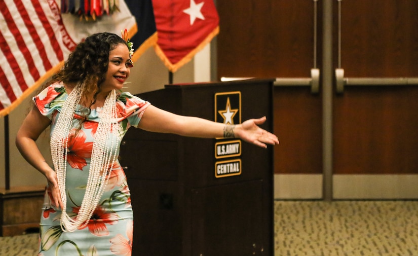 Staff Sgt. Joellene Abadam, U.S. Army reserve affairs Non-Commissioned Officer for U.S. Army Central, performs the Hula dance during the annual Asian American Pacific Islander heritage observance at USARCENT’s headquarters, Patton Hall, Shaw Air Force Base, S.C., May 15, 2019. Throughout the ceremony, traditional dances from the islands of Hawaii, Tahiti and Tonga were performed. Members of USARCENT also prepared a “Taste of the Pacific and Asia” food sampling for attendees to enjoy and experience.