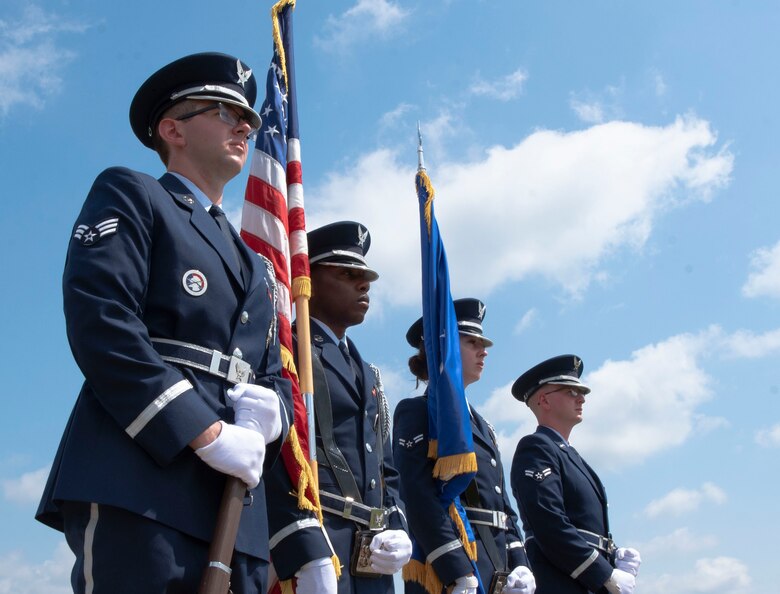 Team Shaw Airmen await their next command while presenting the colors during a mock funeral for their graduation at Shaw Air Force Base, S.C., May 22, 2019.