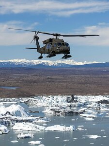 U.S. Army Chief Warrant Officer 4 Franklin Bithos, battalion standardization pilot, and Capt. Anthony Rivas, commander, Bravo Company, 1st Battalion, 207th Aviation Regiment, Alaska Army National Guard, fly a UH-60 Black Hawk helicopter from Anchorage to Juneau, Alaska, April 26, 2019.  Soldiers with the Alaska National Guard from 1-207th conduct cross-country training flights during their final annual training as an air assault unit ahead of their pending transition to becoming a part of a larger general aviation support battalion, expected to finalize this year.